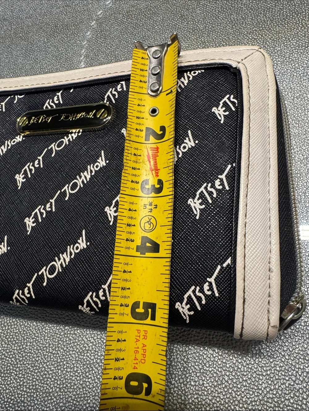 Betsey Johnson Black and Beige Logo Zip-Around Wristlet